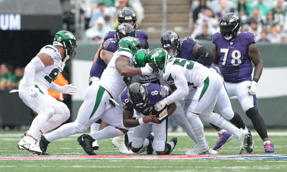 New York Jets guard Laken Tomlinson (78) defends against the