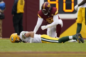 Aaron Rodgers Frusterated on Ground