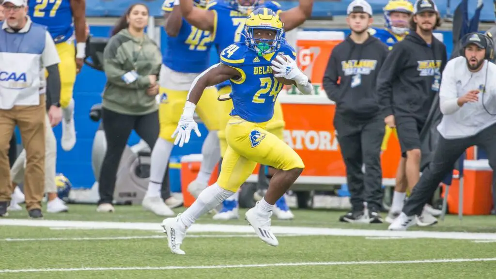 Delaware's Kyron Cumby breaks away for a gain in the Blue Hens' big CAA win over Towson (Photo Courtesy of Delaware Athletics)
