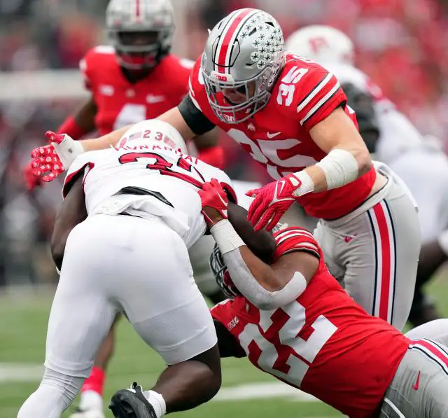 OSU LBs Tommy Eichenberg (35) and Steele Chambers (22) (Photo by Kyle Robertson/Columbus Dispatch)