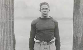 Fritz Pollard in baggy uniform