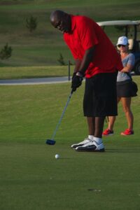 Lawrence Taylor golfing