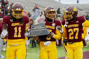 Michigan MAC Trophy hoisted by Central Michigan in 2021.