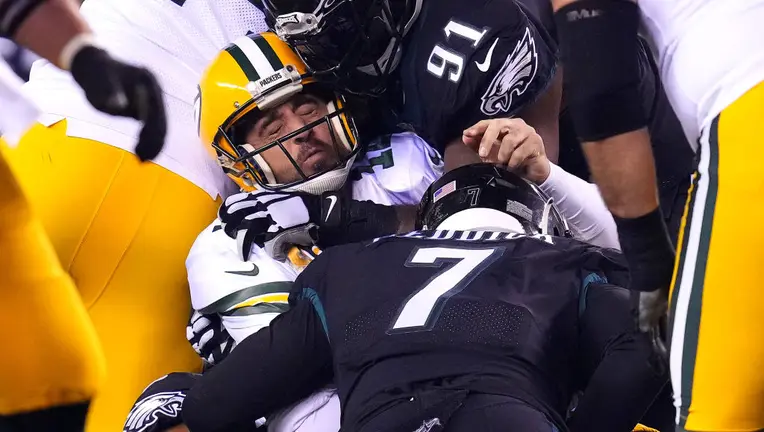 Aaron Rodgers is sacked by Brandon Graham