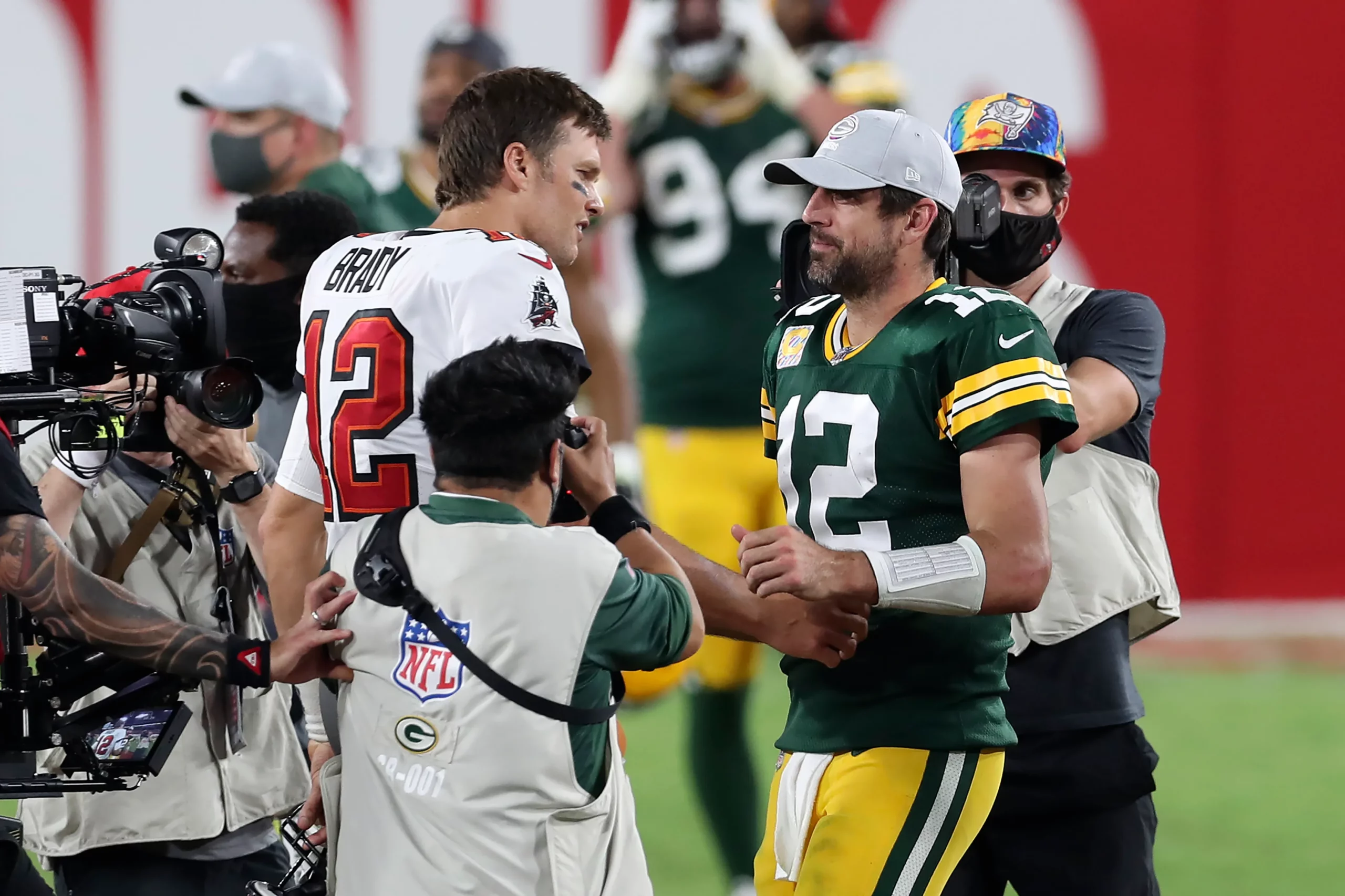 NFL Quarterbacks Aaron Rodgers and Tom Brady. Photo provided by Kassidy Hill/Packers News .