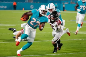 Kalen Ballage previous with Dolphins in the XFL (Wilfredo Lee / AP photo)