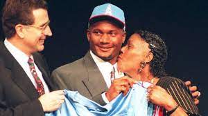 The family of Steve McNair, including his brother, Fred McNair, right, his  mother, Lucille McNair, second from right, and his wife, Mechelle McNair,  left, attend the funeral service for Steve McNair in