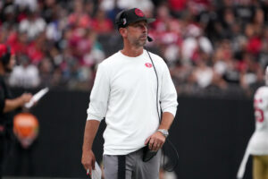 Aug 13, 2023; Paradise, Nevada, USA; San Francisco 49ers coach Kyle Shanahan watches from the sidelines against the Las Vegas Raiders at Allegiant Stadium. Mandatory Credit: Kirby Lee-USA TODAY Sports