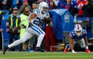 Indianapolis Colts running back Jonathan Taylor (28) makes a run for a touchdown after a pass reception during the first quarter of the game Sunday, Nov. 21, 2021, at Highmark Stadium in Orchard Park, N.Y. © Robert Scheer/IndyStar / USA TODAY NETWORK