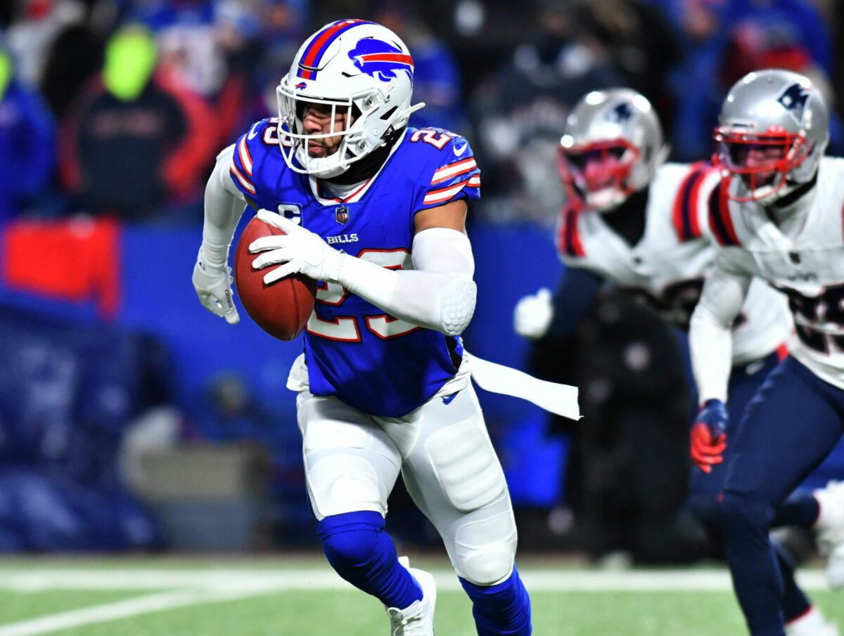 Jan 15, 2022; Orchard Park, New York, USA; Buffalo Bills safety Micah Hyde (23) returns a punt during the fourth quarter of the AFC Wild Card playoff game against the New England Patriots at Highmark Stadium. The Bills won the game 47-17. Mandatory Credit: Mark Konezny-USA TODAY Sports (Aaron Rodgers)