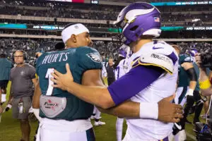 Sep 19, 2022; Philadelphia, Pennsylvania, USA; Philadelphia Eagles quarterback Jalen Hurts (1) and Minnesota Vikings quarterback Kirk Cousins (8) meet on the field after the game at Lincoln Financial Field. Mandatory Credit: Bill Streicher-USA TODAY Sports (Minnesota Vikings, Philadelphia Eagles)