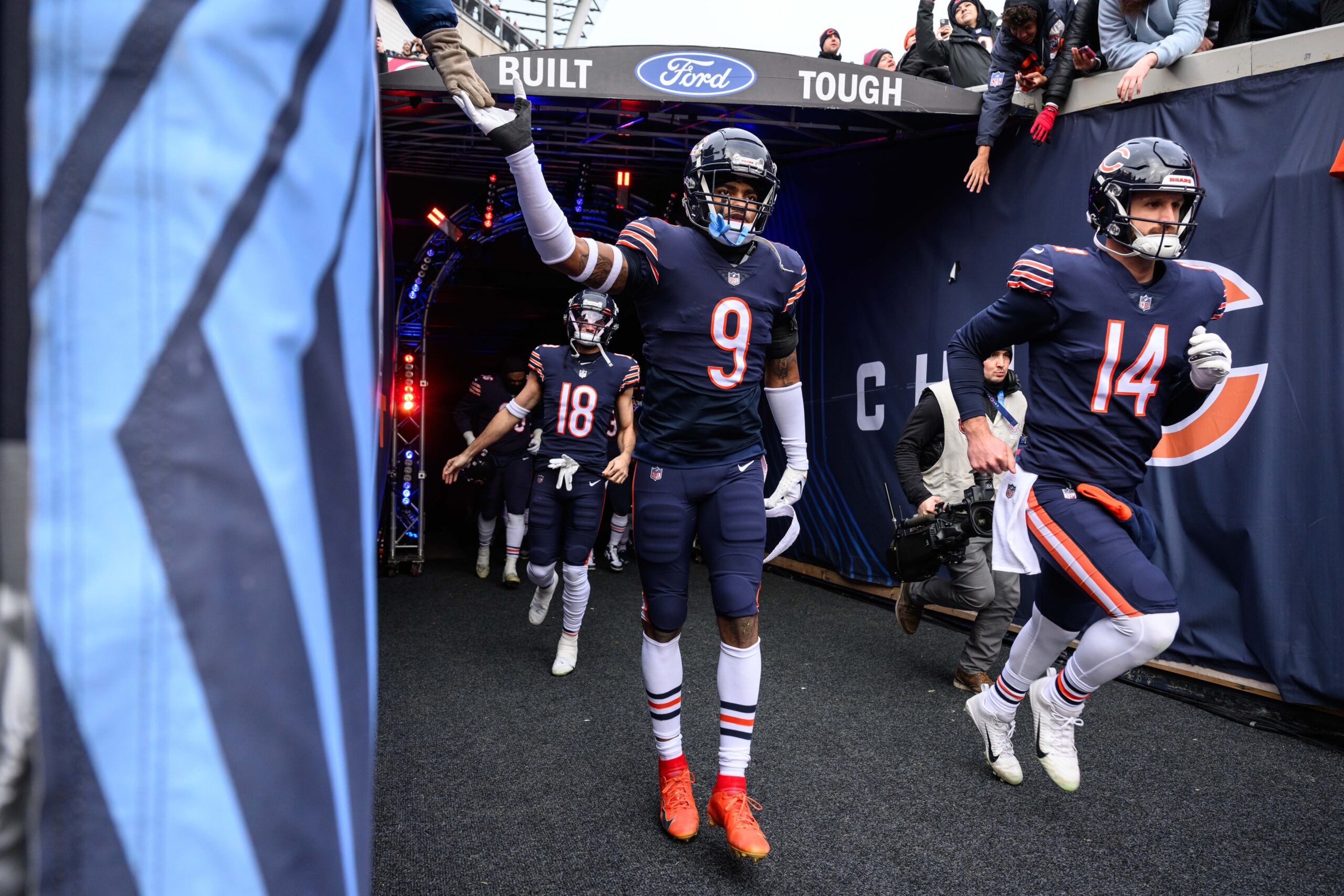 Jan 8, 2023; Chicago, Illinois, USA; Chicago Bears strong safety Jaquan Brisker (9) enters the field before the game against the Minnesota Vikings at Soldier Field. Mandatory Credit: Daniel Bartel-USA TODAY Sports