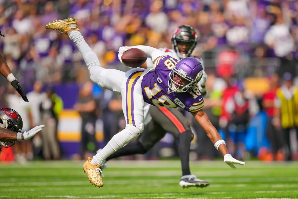 Sep 10, 2023; Minneapolis, Minnesota, USA; Minnesota Vikings wide receiver Justin Jefferson (18) is tackled by the Tampa Bay Buccaneers in the second quarter at U.S. Bank Stadium. Mandatory Credit: Brad Rempel-USA TODAY Sports