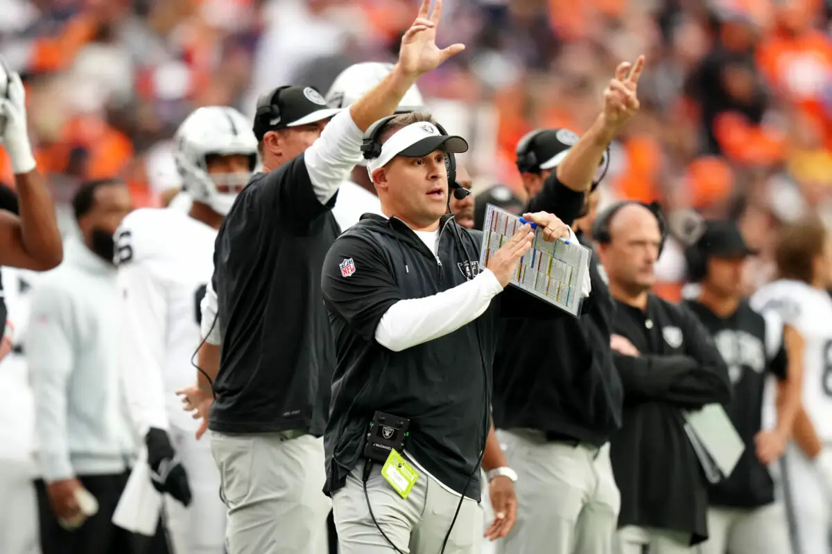 Sep 10, 2023; Denver, Colorado, USA; Las Vegas Raiders head coach Josh McDaniels calls a time out in the second quarter against the Denver Broncos at Empower Field at Mile High. Mandatory Credit: Ron Chenoy-USA TODAY Sports