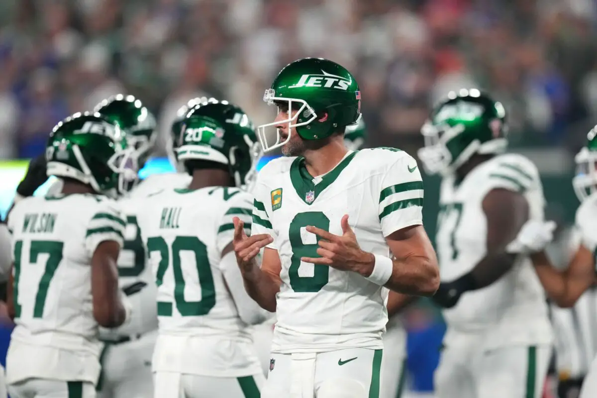 New York Jets quarterback Aaron Rodgers (8) walks onto the field with the offense to face the Buffalo Bills in the home opener at MetLife Stadium on Monday, Sept. 11, 2023, in East Rutherford. © Danielle Parhizkaran/NorthJersey.com / USA TODAY NETWORK