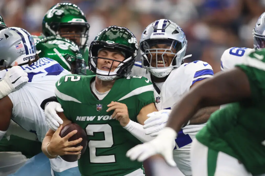 Zach Wilson Sep 17, 2023; Arlington, Texas, USA; New York Jets quarterback Zach Wilson (2) is sacked by Dallas Cowboys linebacker Micah Parsons (11) in the first quarter at AT&T Stadium. Mandatory Credit: Tim Heitman-USA TODAY Sports