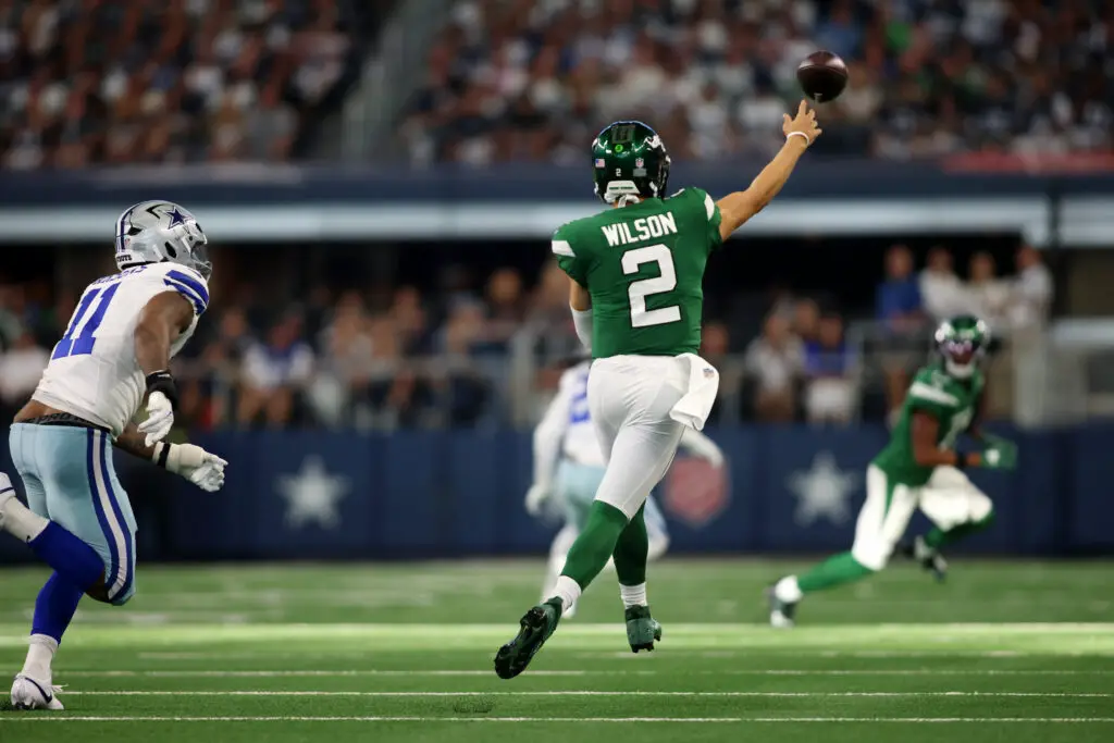 Sep 17, 2023; Arlington, Texas, USA; New York Jets quarterback Zach Wilson (2) throws a pass in the fourth quarter as Dallas Cowboys linebacker Micah Parsons (11) defends at AT&T Stadium. Mandatory Credit: Tim Heitman-USA TODAY Sports