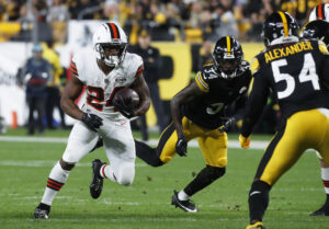 Sep 18, 2023; Pittsburgh, Pennsylvania, USA; Cleveland Browns running back Nick Chubb (24) runs the ball against the Pittsburgh Steelers during the first quarter at Acrisure Stadium. Mandatory Credit: Charles LeClaire-USA TODAY Sports