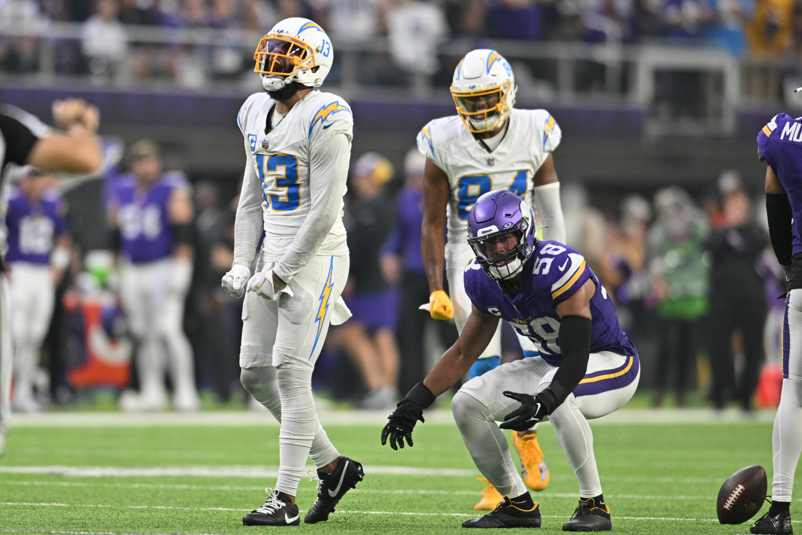 Sep 24, 2023; Minneapolis, Minnesota, USA; Los Angeles Chargers wide receiver Keenan Allen (13) reacts as Minnesota Vikings linebacker Jordan Hicks (58) looks on during the fourth quarter at U.S. Bank Stadium. Mandatory Credit: Jeffrey Becker-USA TODAY Sports