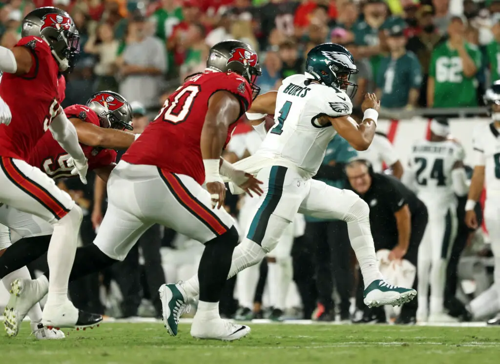 Sep 25, 2023; Tampa, Florida, USA; Philadelphia Eagles quarterback Jalen Hurts (1) runs with the ball against the Tampa Bay Buccaneers during the first half at Raymond James Stadium. Mandatory Credit: Kim Klement Neitzel-USA TODAY Sports