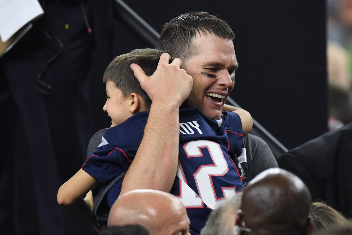 Feb 5, 2017; Houston, TX, USA; New England Patriots quarterback Tom Brady (12) greets his son after the win over Atlanta Falcons during Super Bowl LI at NRG Stadium. The Patriots won 34-28. Mandatory Credit: Bob Donnan-USA TODAY Sports