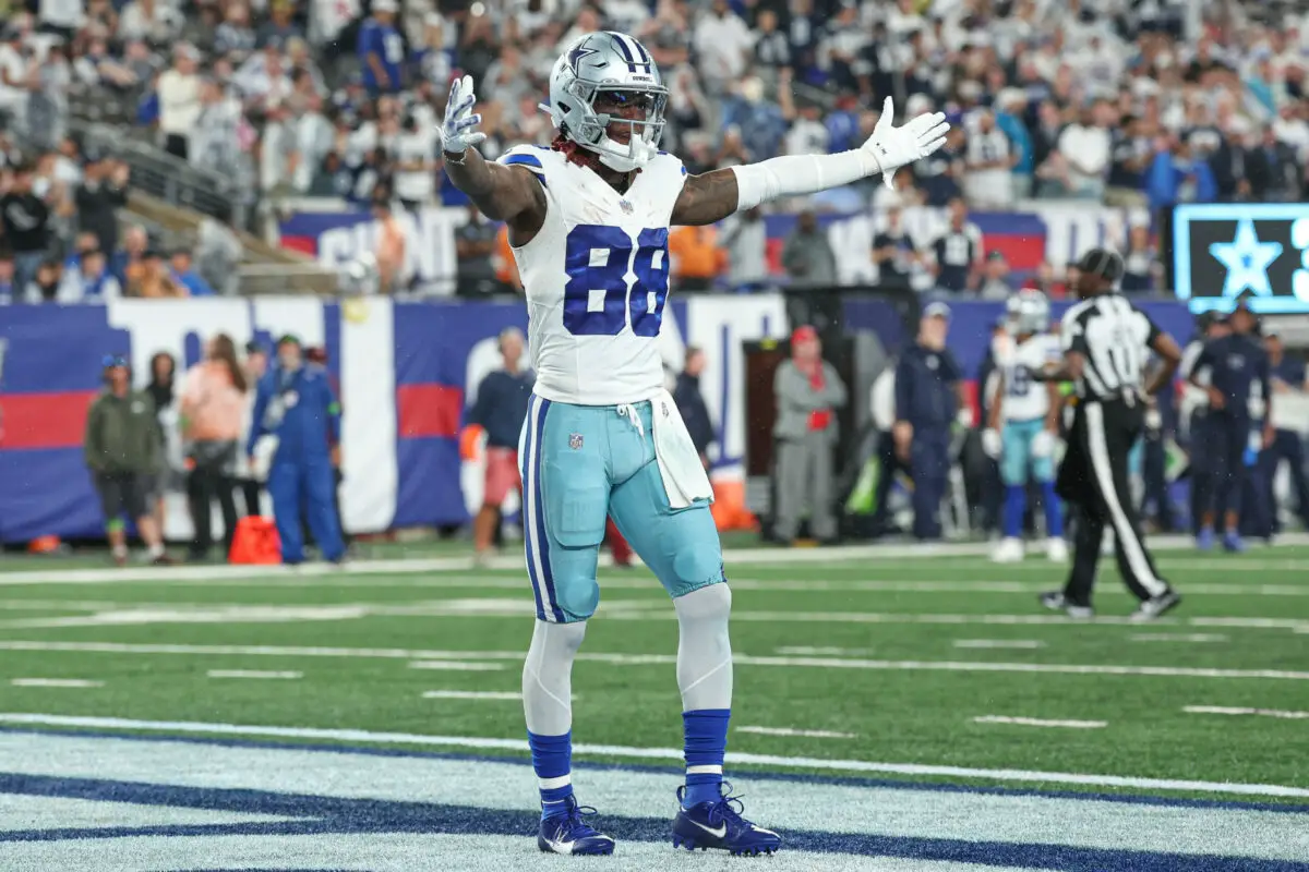 CeeDee Lamb of the Dallas Cowboys runs out onto the field prior to