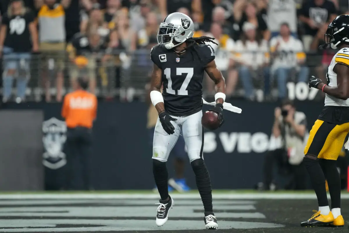 Sep 24, 2023; Paradise, Nevada, USA; Las Vegas Raiders wide receiver Davante Adams (17) reacts after catching a touchdown pass against the Pittsburgh Steelers in the first half at Allegiant Stadium. Mandatory Credit: Kirby Lee-USA TODAY Sports