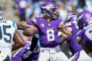 Oct 1, 2023; Charlotte, North Carolina, USA; Minnesota Vikings quarterback Kirk Cousins (8) passes during the second half against the Carolina Panthers at Bank of America Stadium. Mandatory Credit: Jim Dedmon-USA TODAY Sports