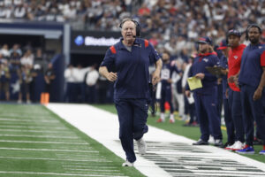 Oct 1, 2023; Arlington, Texas, USA; New England Patriots head coach Bill Belichick runs down the sidelines to call a time out in the first quarter against the Dallas Cowboys at AT&T Stadium. Mandatory Credit: Tim Heitman-USA TODAY Sports