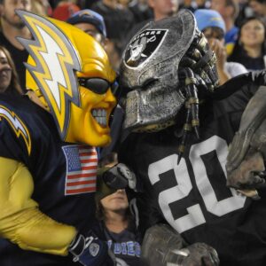 Fight Chargers and Raiders fans fighting over the game.