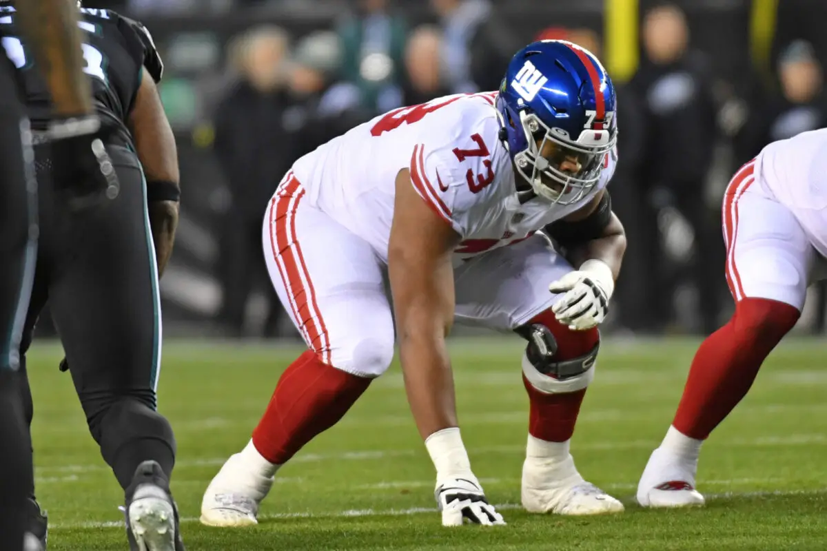 New York Giants Evan Neal protects Daniel Jones