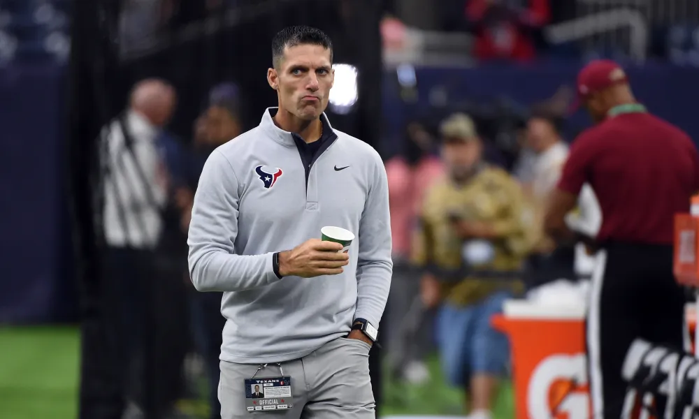 Houston Texans general manager Nick Caserio walks on the field before an NFL preseason football game against the Tampa Bay Buccaneers Saturday, Aug. 28, 2021, in Houston. (AP Photo/Eric Christian Smith)