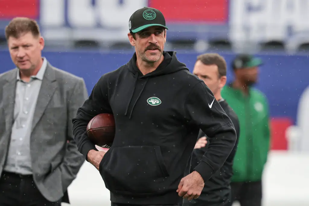 Oct 29, 2023; East Rutherford, New Jersey, USA; New York Jets quarterback Aaron Rodgers (8) on the field before the game against the New York Giants at MetLife Stadium. Mandatory Credit: Vincent Carchietta-USA TODAY Sports