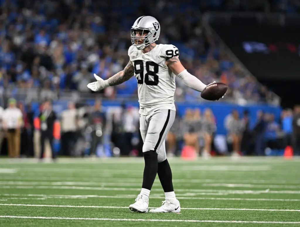 Oct 30, 2023; Detroit, Michigan, USA; Las Vegas Raiders defensive end Maxx Crosby (98) waits for a referee call for on a fumble recovery near the goal line against the Detroit Lions in the third quarter at Ford Field. Mandatory Credit: Lon Horwedel-USA TODAY Sports (Kansas City Chiefs)