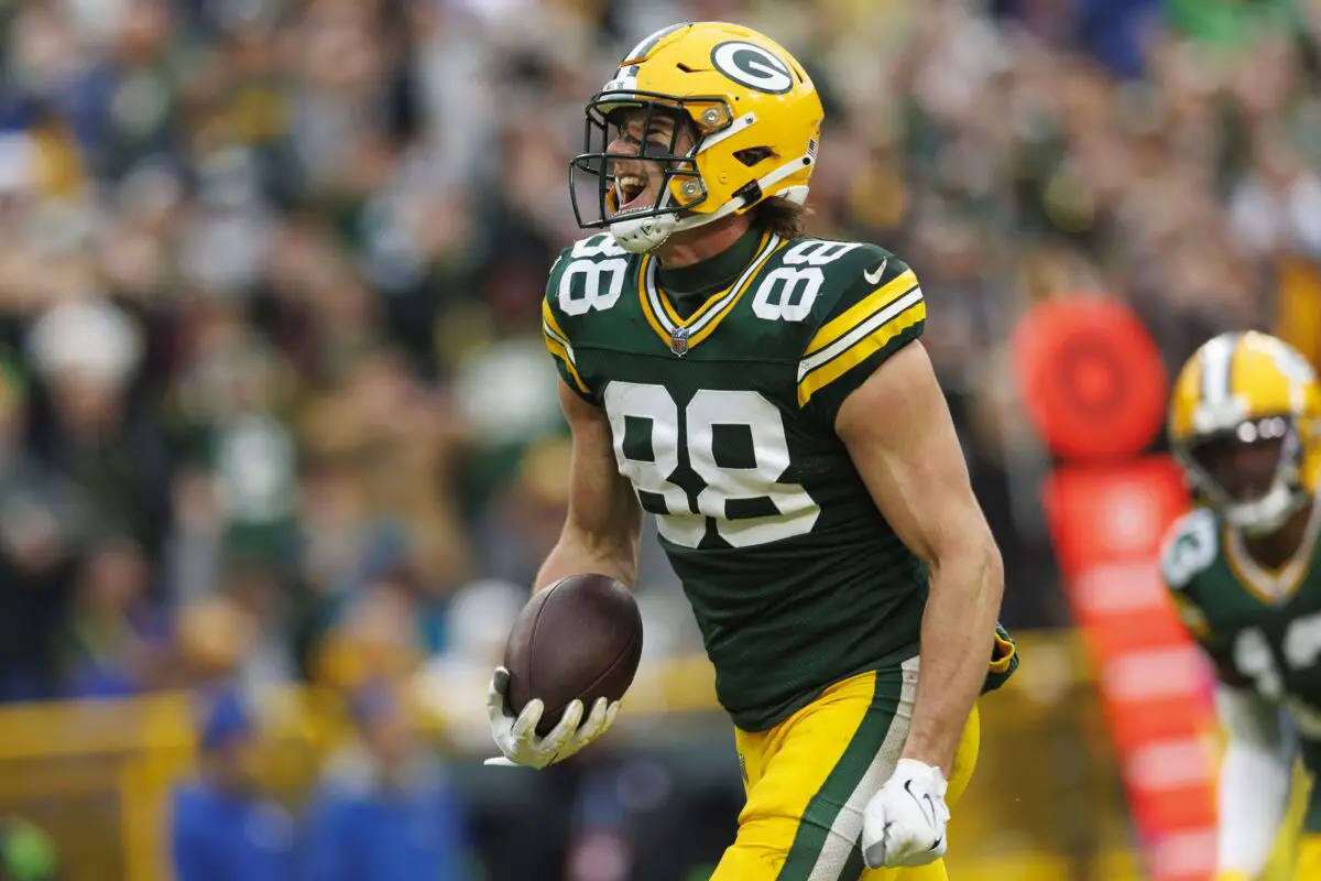 Nov 5, 2023; Green Bay, Wisconsin, USA; Green Bay Packers tight end Luke Musgrave (88) celebrates scoring a touchdown during the fourth quarter against the Los Angeles Rams at Lambeau Field. Mandatory Credit: Jeff Hanisch-USA TODAY Sports