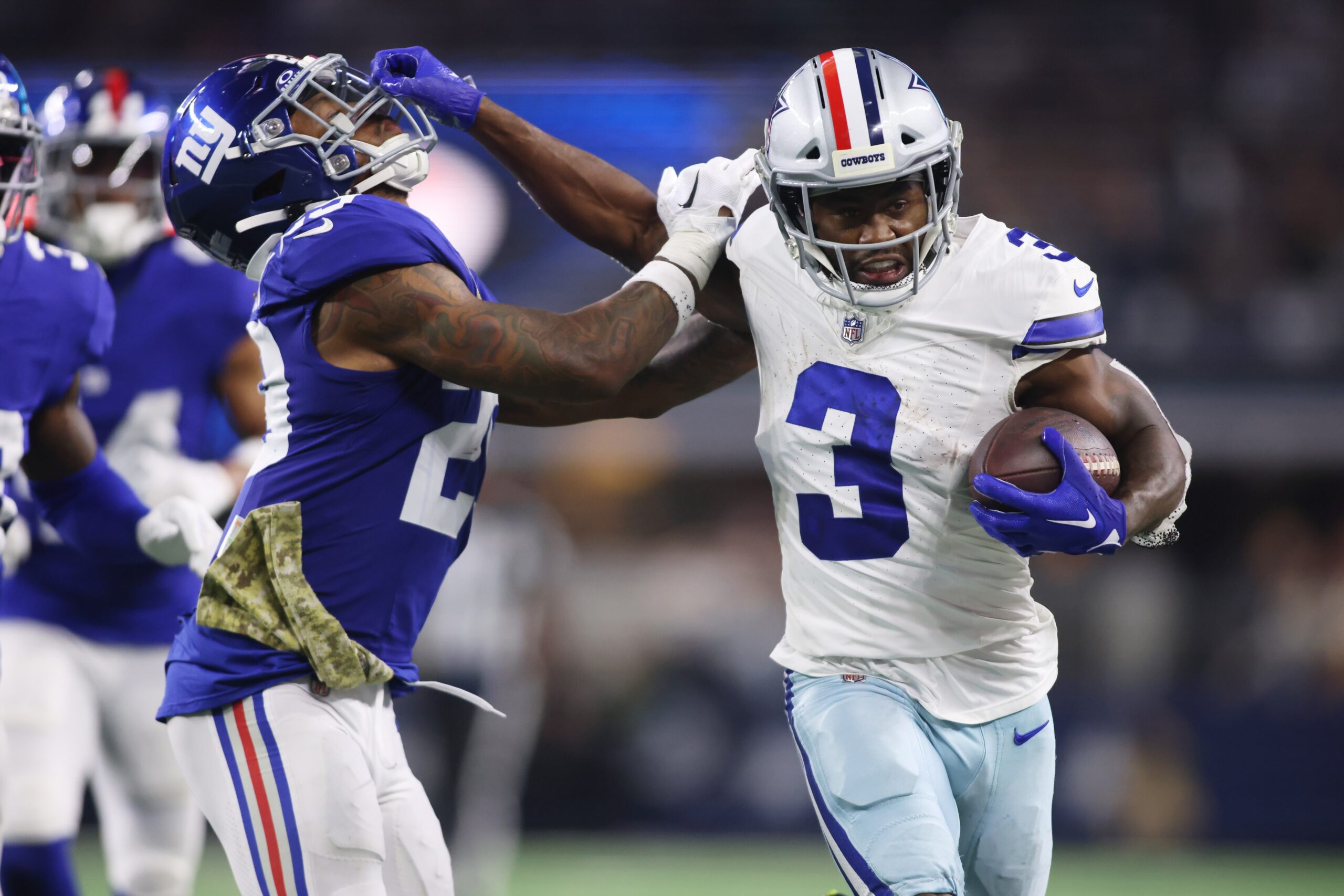 Nov 12, 2023; Arlington, Texas, USA; Dallas Cowboys wide receiver Brandin Cooks (3) stiff arms New York Giants safety Xavier McKinney (29) in the third quarter at AT&T Stadium. Mandatory Credit: Tim Heitman-USA TODAY Sports