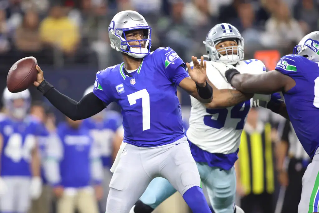 Nov 30, 2023; Arlington, Texas, USA; Seattle Seahawks quarterback Geno Smith (7) throws to pass against the Dallas Cowboys during the second half at AT&T Stadium. Mandatory Credit: Tim Heitman-USA TODAY Sports