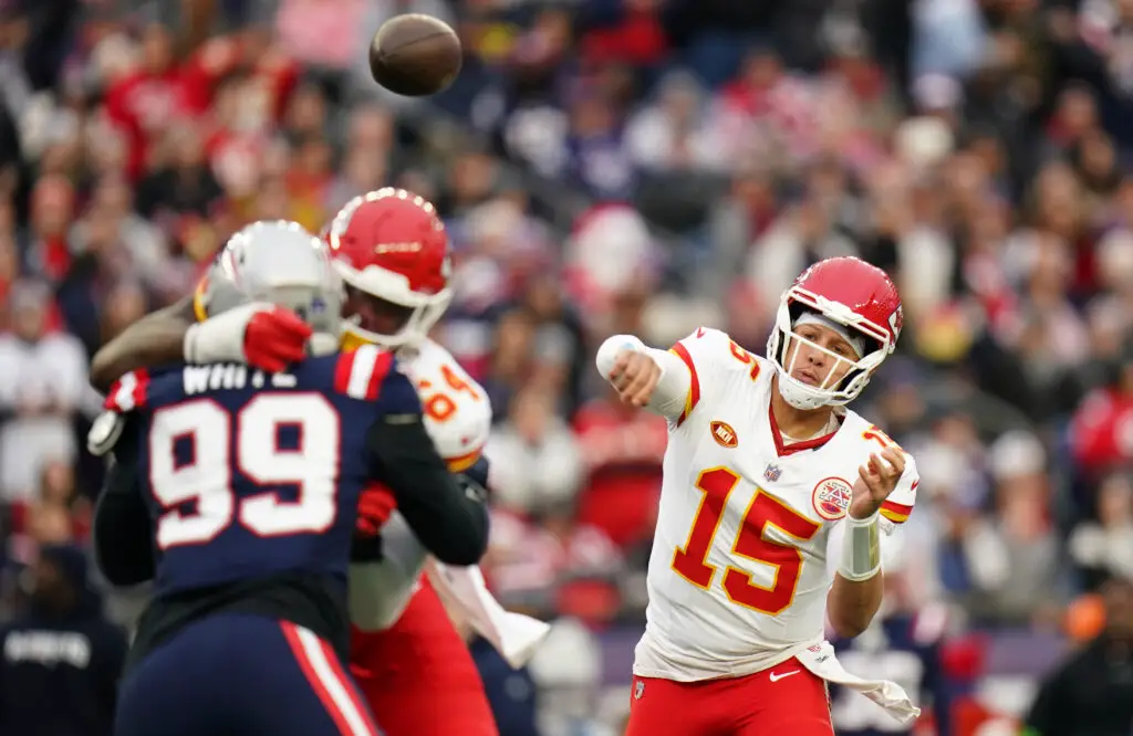 Dec 17, 2023; Foxborough, Massachusetts, USA; Kansas City Chiefs quarterback Patrick Mahomes (15) throws a pass against the New England Patriots in the first quarter at Gillette Stadium. Mandatory Credit: David Butler II-USA TODAY Sports