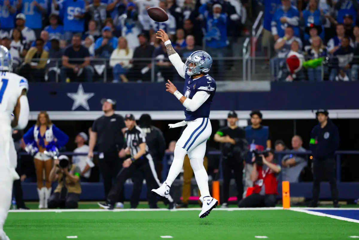 Dec 30, 2023; Arlington, Texas, USA; Dallas Cowboys quarterback Dak Prescott (4) throws a touchdown pass during the first half against the Detroit Lions at AT&T Stadium. Mandatory Credit: Kevin Jairaj-USA TODAY Sports