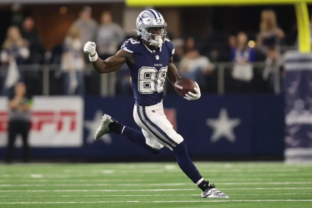 Dec 30, 2023; Arlington, Texas, USA; Dallas Cowboys wide receiver CeeDee Lamb (88) runs the ball in the second half against the Detroit Lions at AT&T Stadium. Mandatory Credit: Tim Heitman-USA TODAY Sports