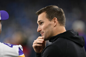 Jan 7, 2024; Detroit, Michigan, USA; Minnesota Vikings quarterback Kirk Cousins (8) talks with teammates prior to their game against the Detroit Lions at Ford Field. Mandatory Credit: Lon Horwedel-USA TODAY Sports