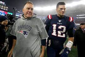 Tom Brady and Bill Belichick walk off together after another Super Bowl win