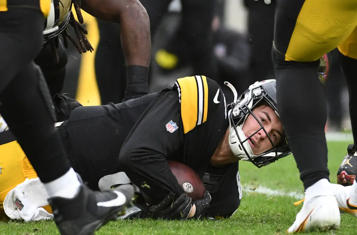 Nov 13, 2022; Pittsburgh, Pennsylvania, USA; Pittsburgh Steelers quarterback Kenny Pickett (8) looks at his progress after keeping the ball for a run against the New Orleans Saints during the second quarter at Acrisure Stadium. Mandatory Credit: Philip G. Pavely-USA TODAY Sports