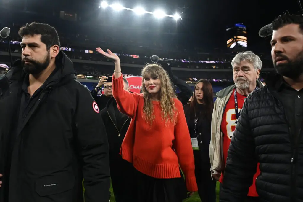 Jan 28, 2024; Baltimore, Maryland, USA; American singer-songwriter Taylor Swift (center) walks off the field after the Kansas City Chiefs won the AFC Championship football game against the Baltimore Ravens at M&T Bank Stadium. Mandatory Credit: Tommy Gilligan-USA TODAY Sports