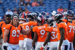 Nov. 19, 2023; Denver, CO, USA; Denver Broncos huddle prior to a preseason game against the Minnesota Vikings at Empower Field at Mile High. Mandatory Credit: Ron Chenoy-USA TODAY Sports