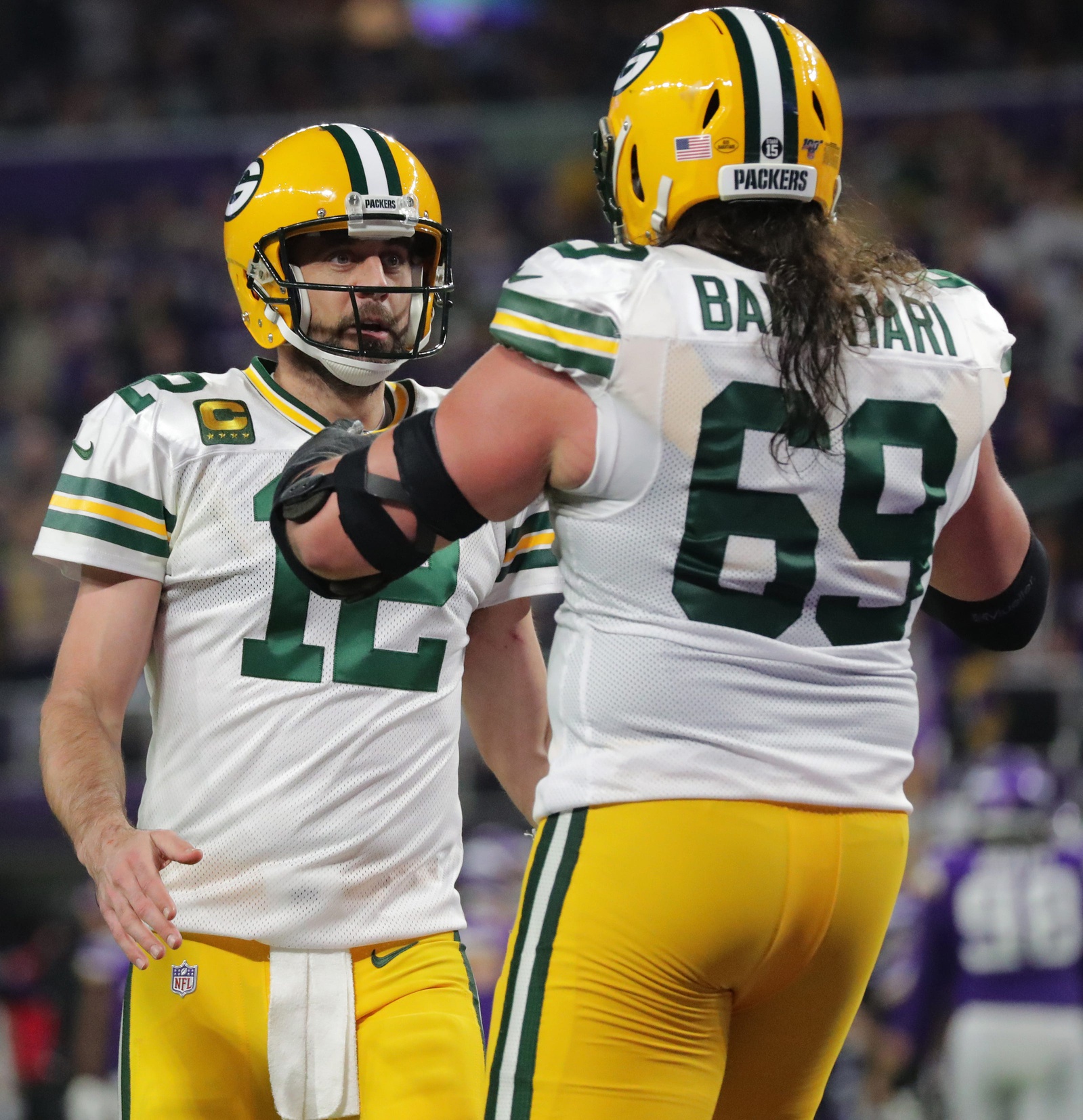 Breaking: Aaron Rodgers Snubbed Longtime Friend from Wedding, Speaks Out On Social Media (Report) 3 Green Bay Packers quarterback Aaron Rodgers (12) celebrates a touchdown by running back Aaron Jones (33) with offensive tackle David Bakhtiari (69) during the third quarter of their game Monday, December 23, 2019 at US Bank Stadium in Minneapolis, Minn. The Green Bay Packers beat the Minnesota Vikings 23-10.