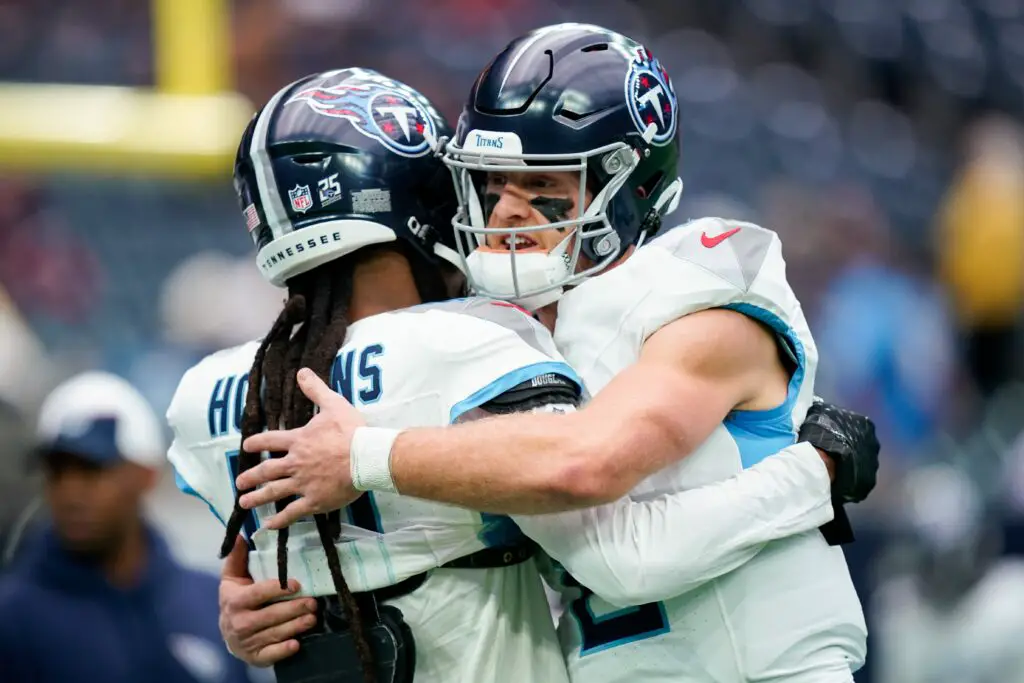 Tennessee Titans quarterback Will Levis (8) hugs wide receiver DeAndre Hopkins (10) before a game against the Houston Texans at NRG Stadium in Houston, Texas., Sunday, Dec. 31, 2023. (Commanders)