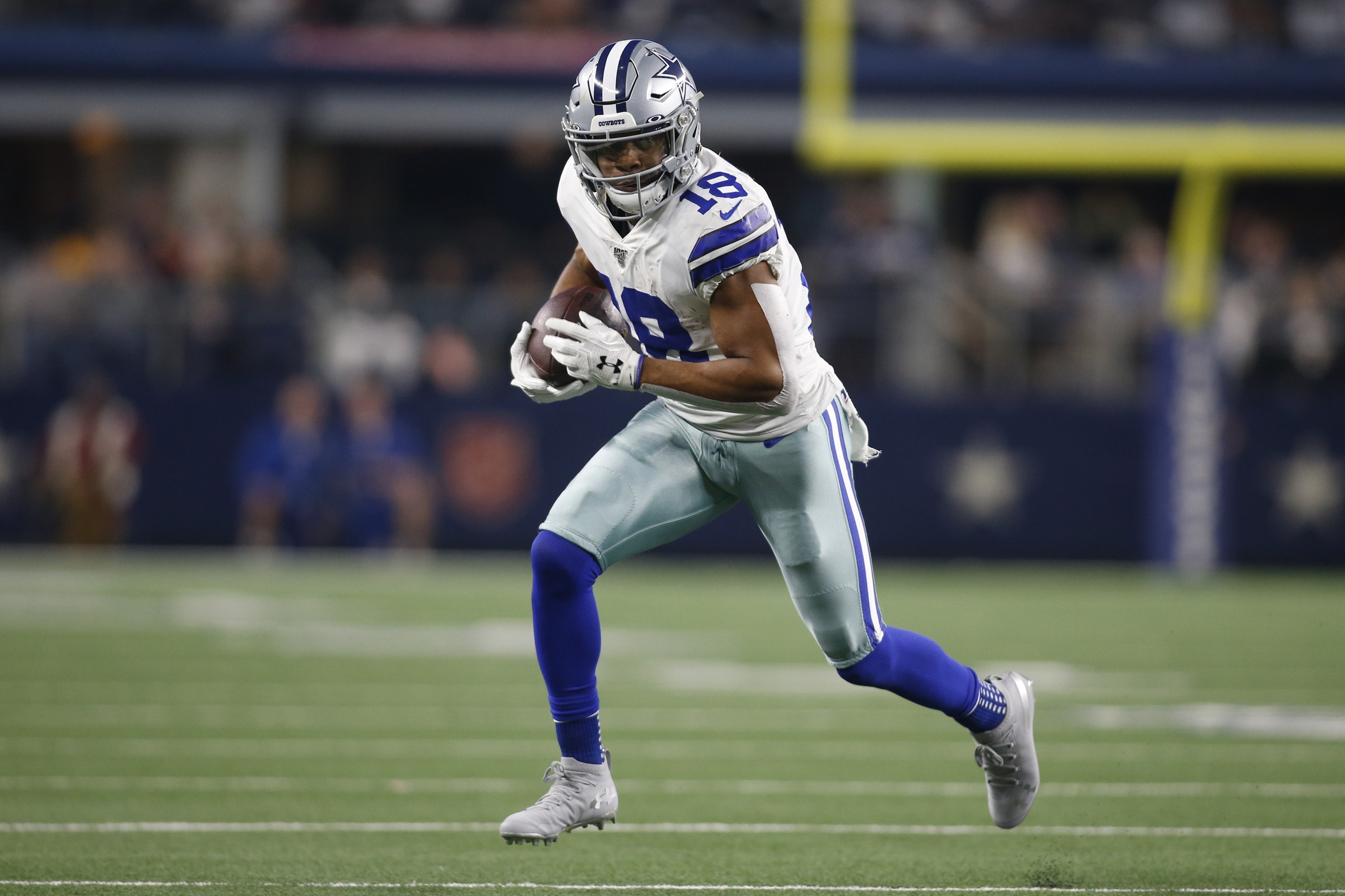Dec 29, 2019; Arlington, Texas, USA; Dallas Cowboys wide receiver Randall Cobb (18) runs the ball after catching a pass in the third quarter against the Washington Redskins at AT&T Stadium. Mandatory Credit: Tim Heitman-USA TODAY Sports