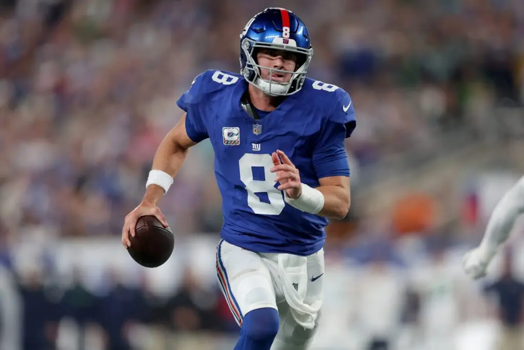 Oct 2, 2023; East Rutherford, New Jersey, USA; New York Giants quarterback Daniel Jones (8) runs with the ball against the Seattle Seahawks during the third quarter at MetLife Stadium. Mandatory Credit: Brad Penner-USA TODAY Sports