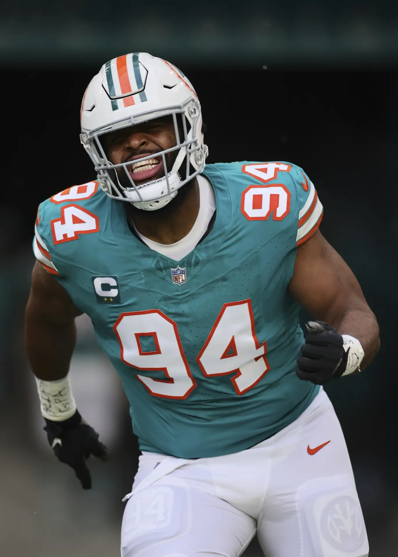 Dec 24, 2023; Miami Gardens, Florida, USA; Miami Dolphins defensive tackle Christian Wilkins (94) runs on the field prior to the game Dallas Cowboys at Hard Rock Stadium. Mandatory Credit: Sam Navarro-USA TODAY Sports NFL